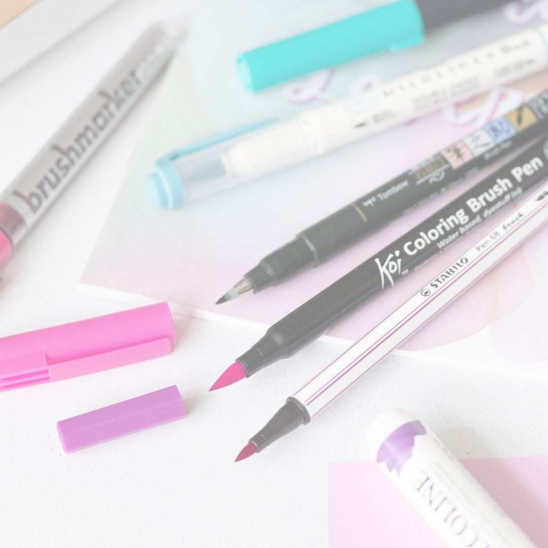 Set of coloring brush pens on a white background