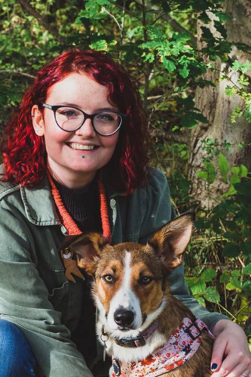 Rosie with her dog planning content for the blog